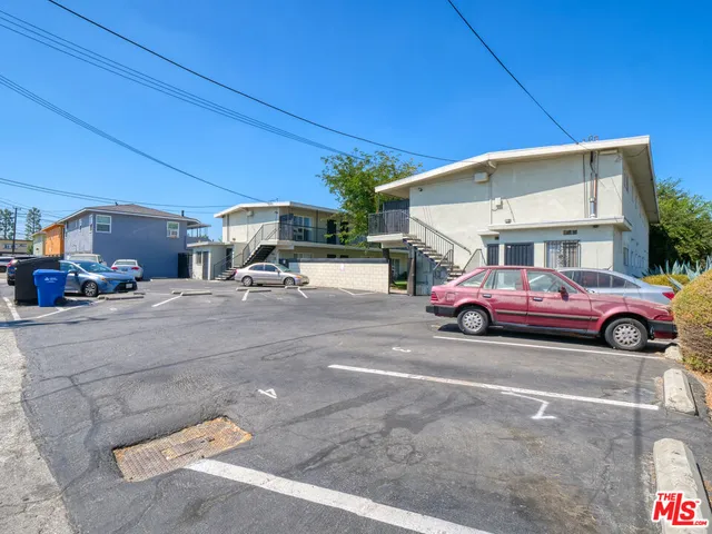 a view of a cars parked in front of a building