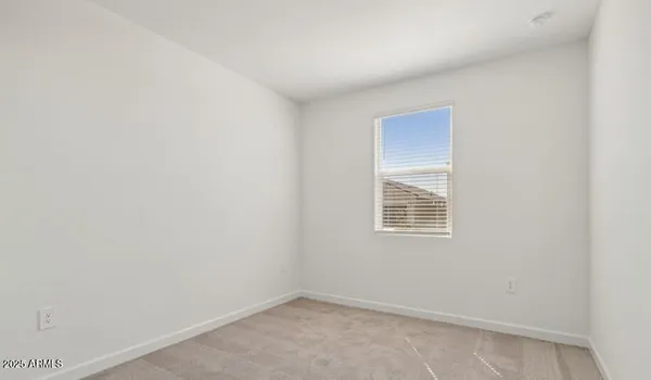 a view of walk in closet with cabinet