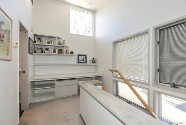 a view of cabinets and window