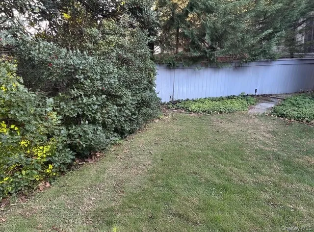 a view of a backyard of a house