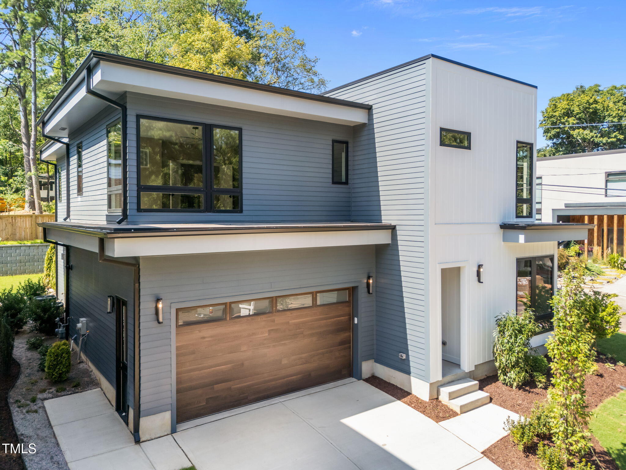2321 Turners Alley Raleigh, NC 27607 - Photo 1 of 43 a front view of a house with garden