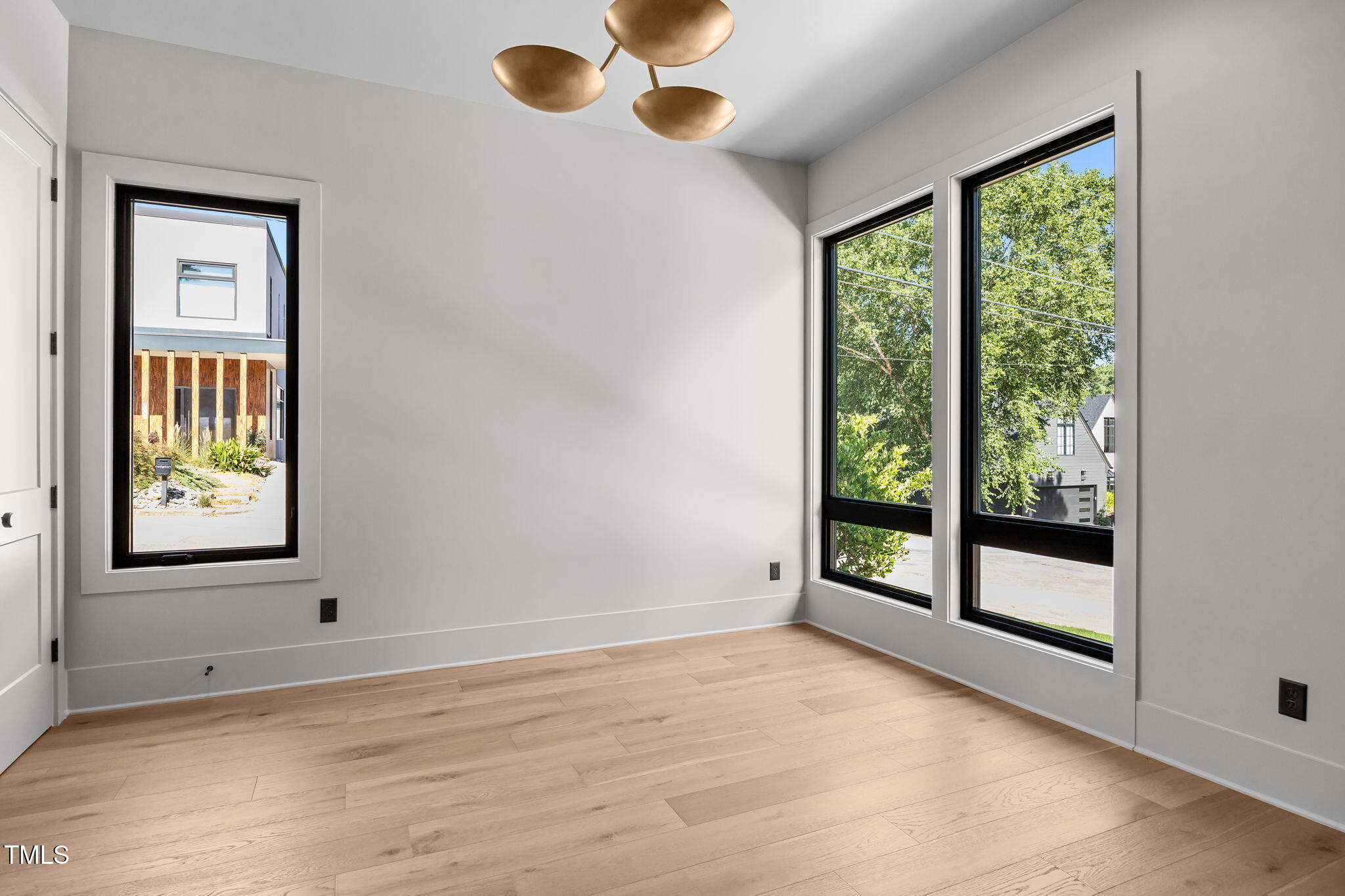 2321 Turners Alley Raleigh, NC 27607 - Photo 5 of 43 a view of an empty room with a window