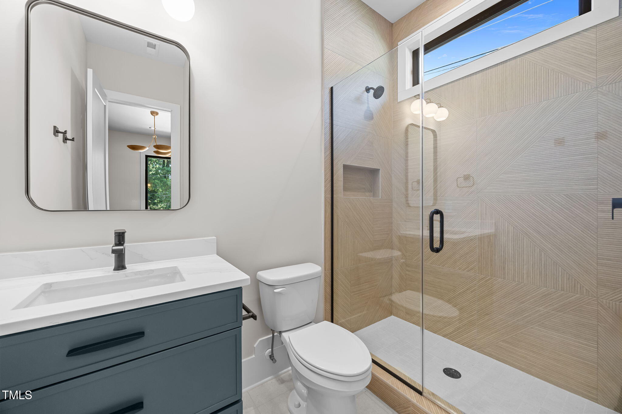 2321 Turners Alley Raleigh, NC 27607 - Photo 7 of 43 a bathroom with a sink a toilet and shower