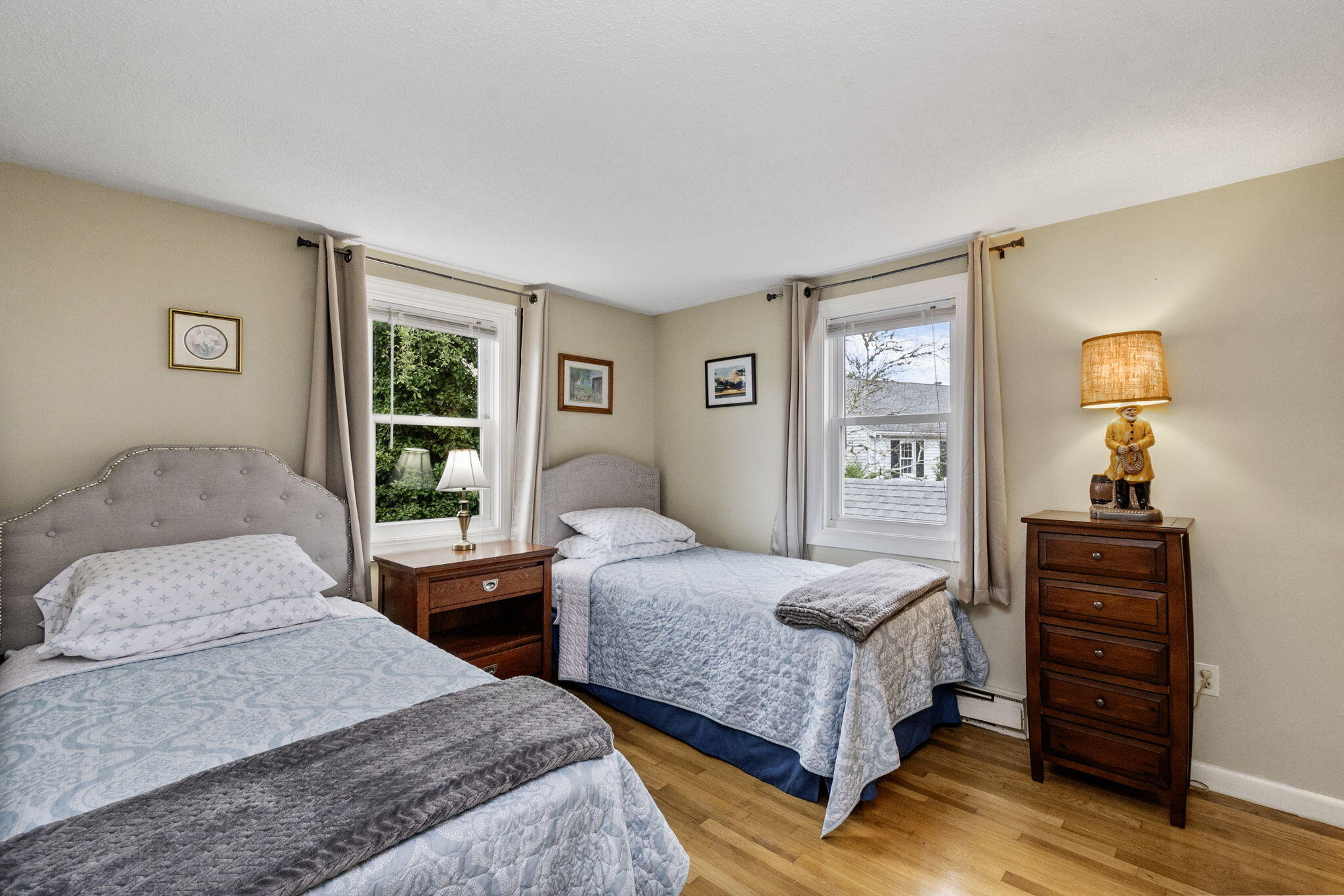 102 Sea Street Dennis Port, MA 02639 - Photo 33 of 37 a bedroom with a bed and wooden floor