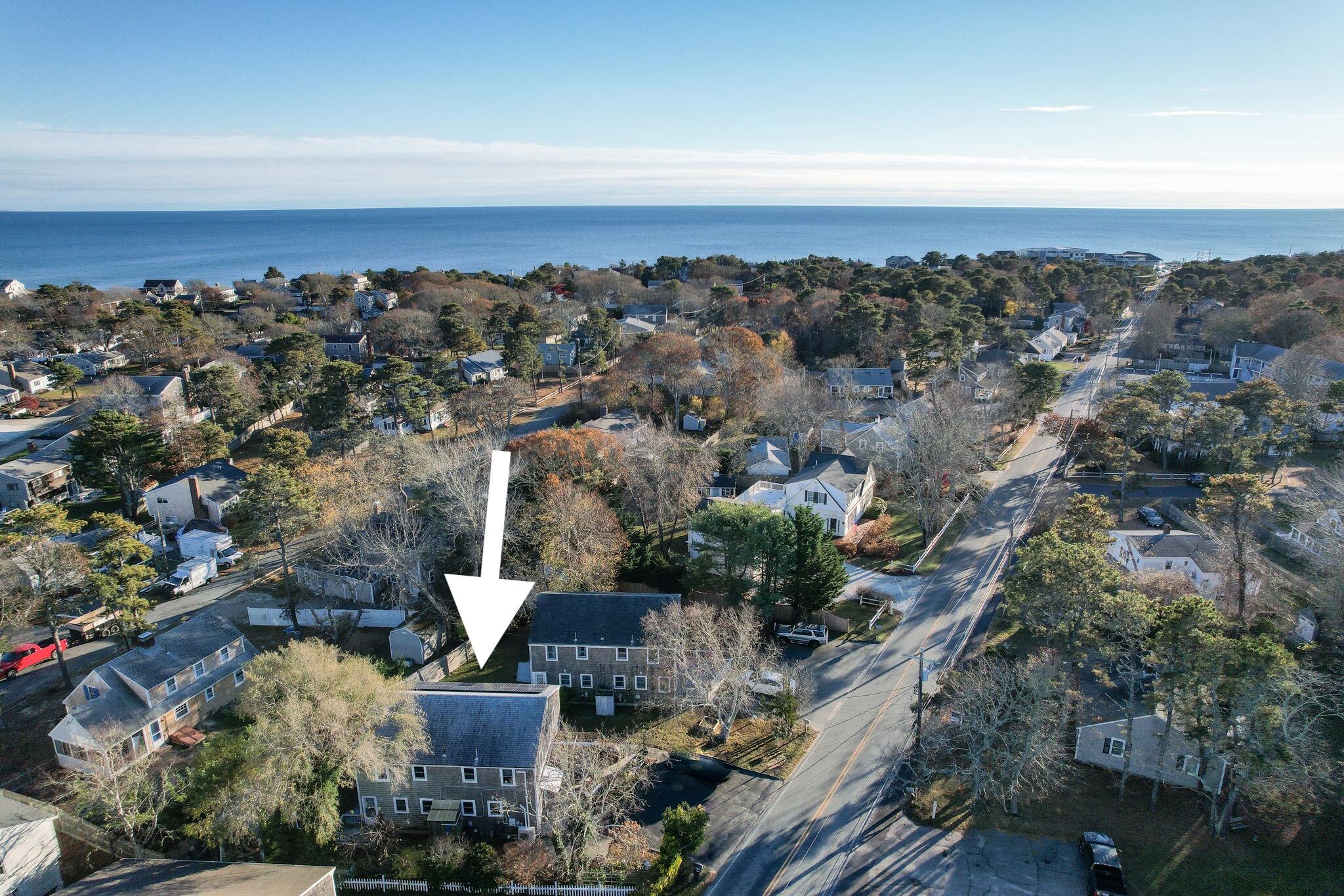 102 Sea Street Dennis Port, MA 02639 - Photo 37 of 37 an aerial view of a house with a lake
