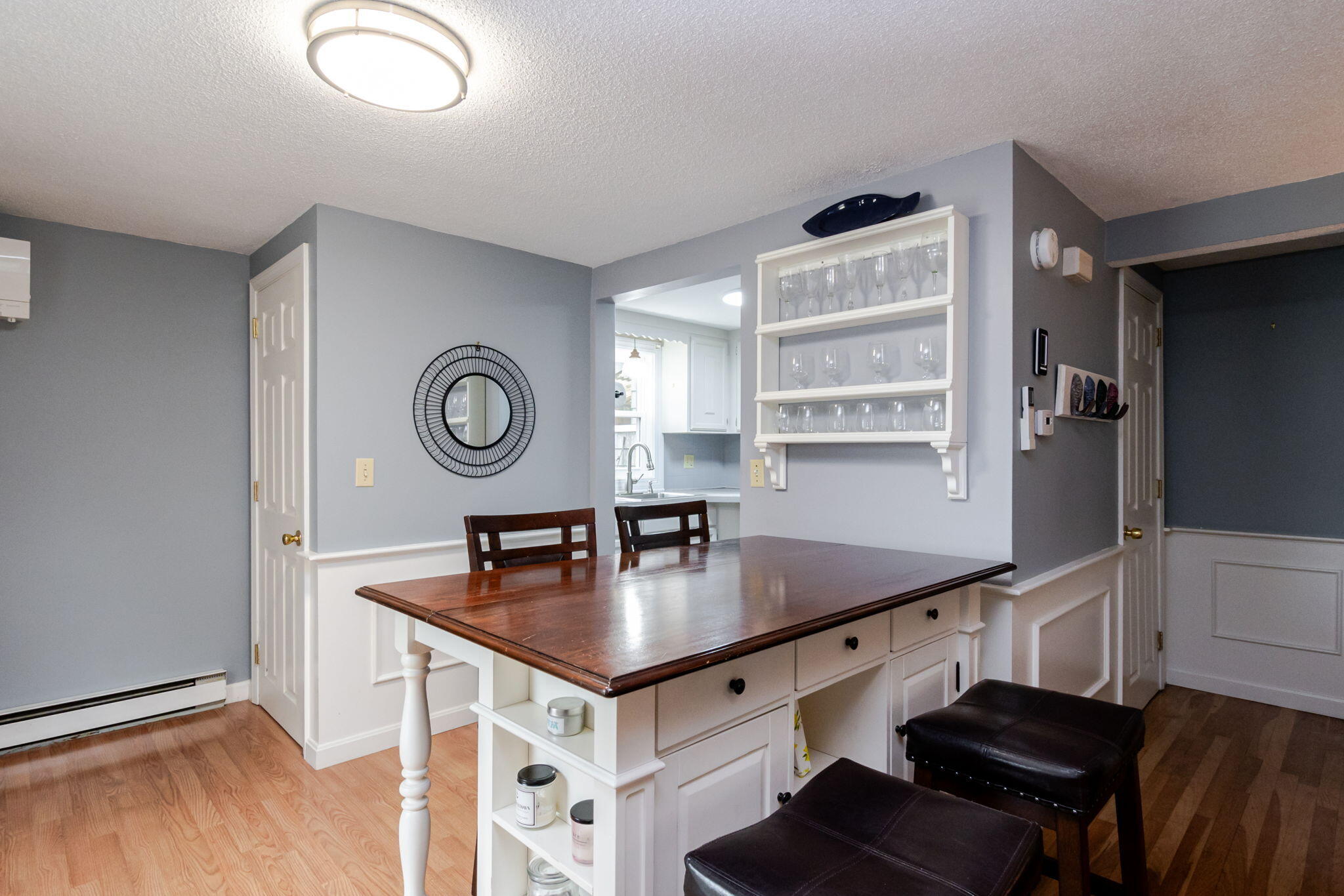 102 Sea Street Dennis Port, MA 02639 - Photo 8 of 37 a kitchen with a sink cabinets and window