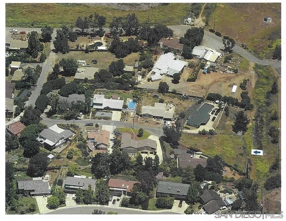 Quicker Road El Cajon, CA 92020 - Photo 4 of 12 an aerial view of residential houses with outdoor space