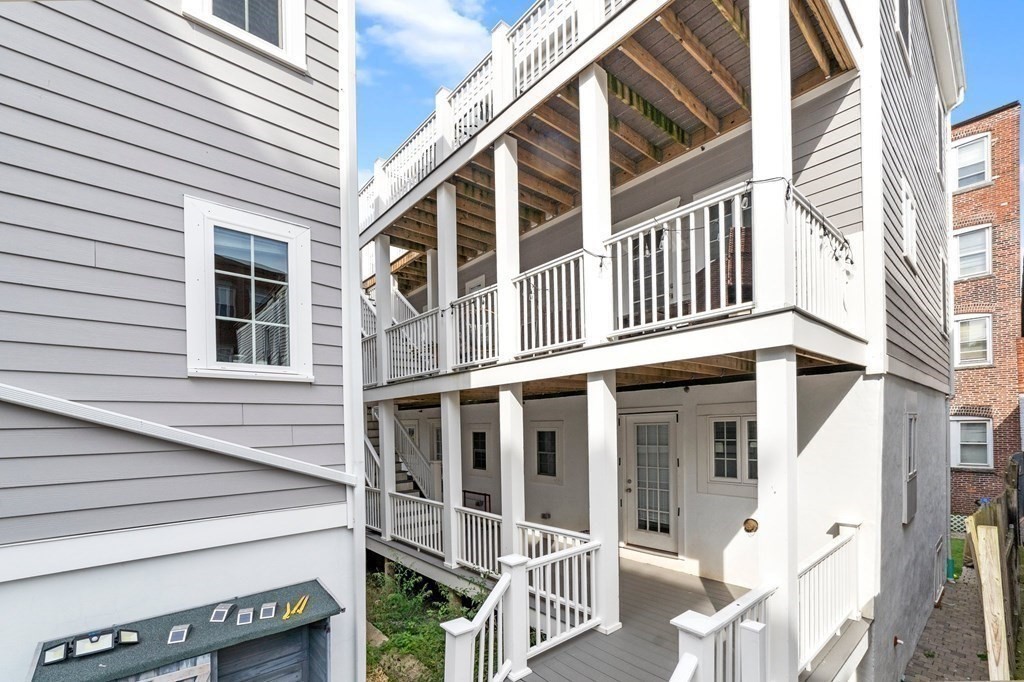 309 R Sumner Street, Unit 3 Boston, MA 02128 - Photo 11 of 16 a view of a house with a window
