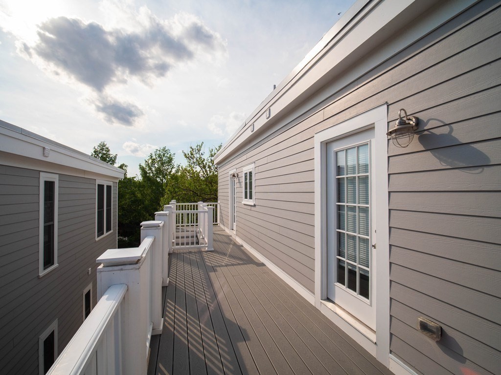 309 R Sumner Street, Unit 3 Boston, MA 02128 - Photo 10 of 16 a view of deck with patio