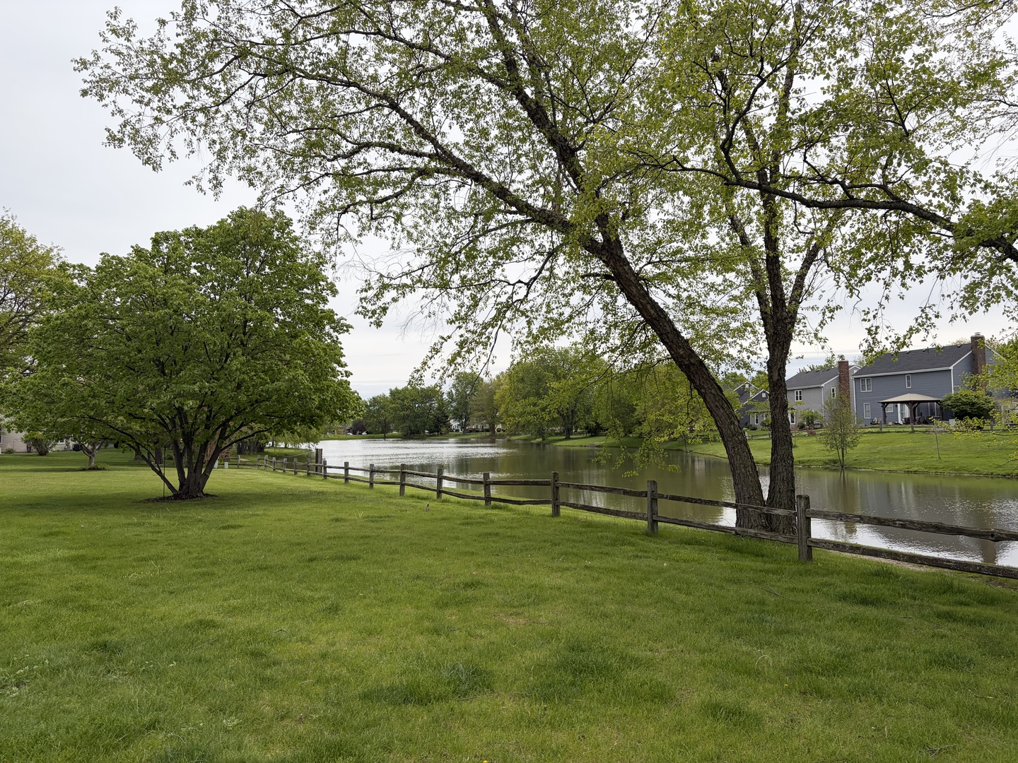 318 Dunham Place Commons, Unit 318 St. Charles, IL 60174 - Photo 18 of 20 a view of a park with large trees