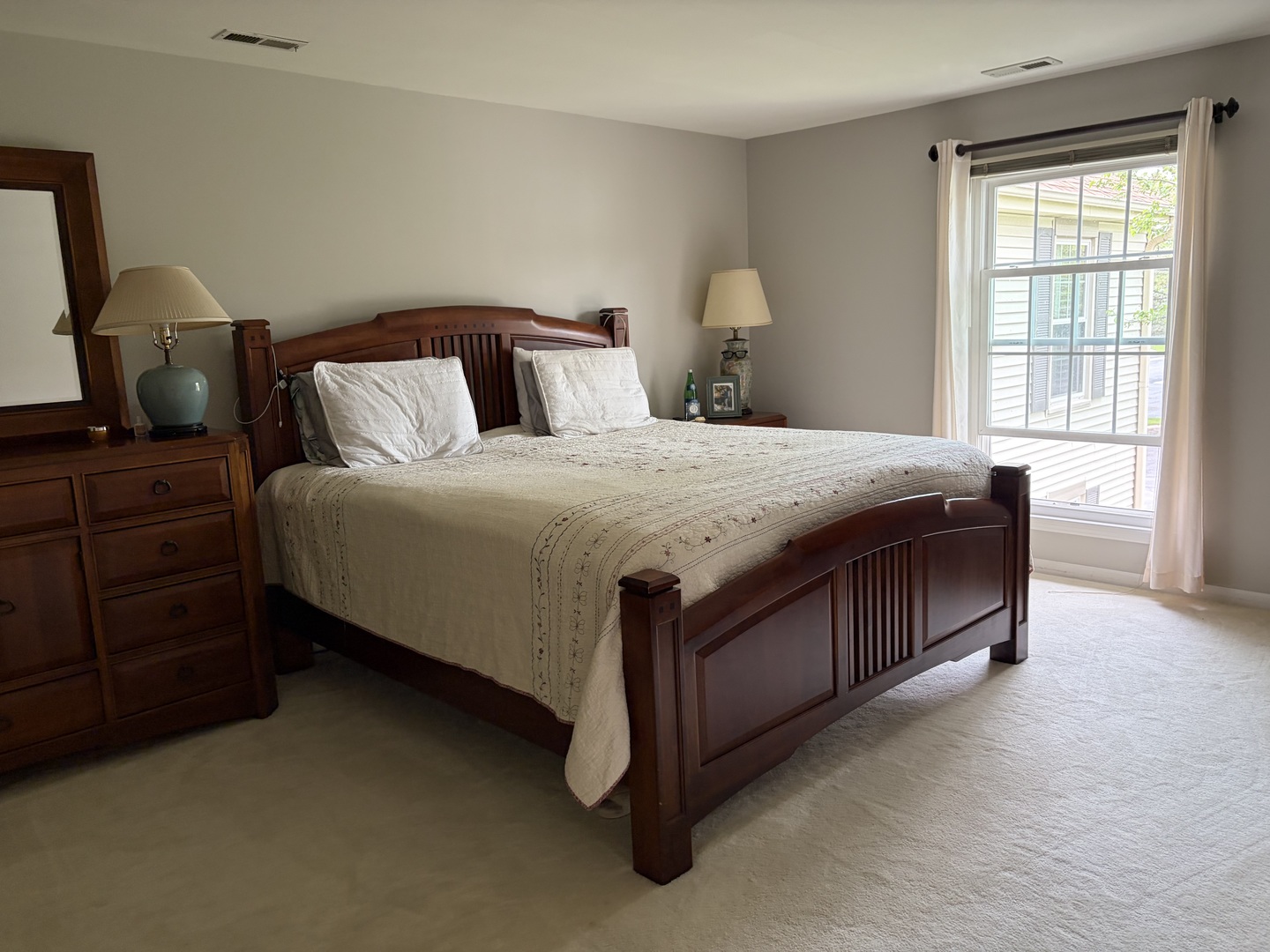 318 Dunham Place Commons, Unit 318 St. Charles, IL 60174 - Photo 10 of 20 a bedroom with a bed and window