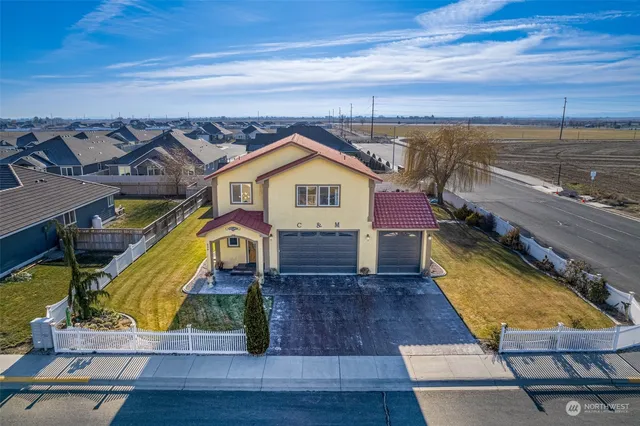 a view of a house with a ocean view