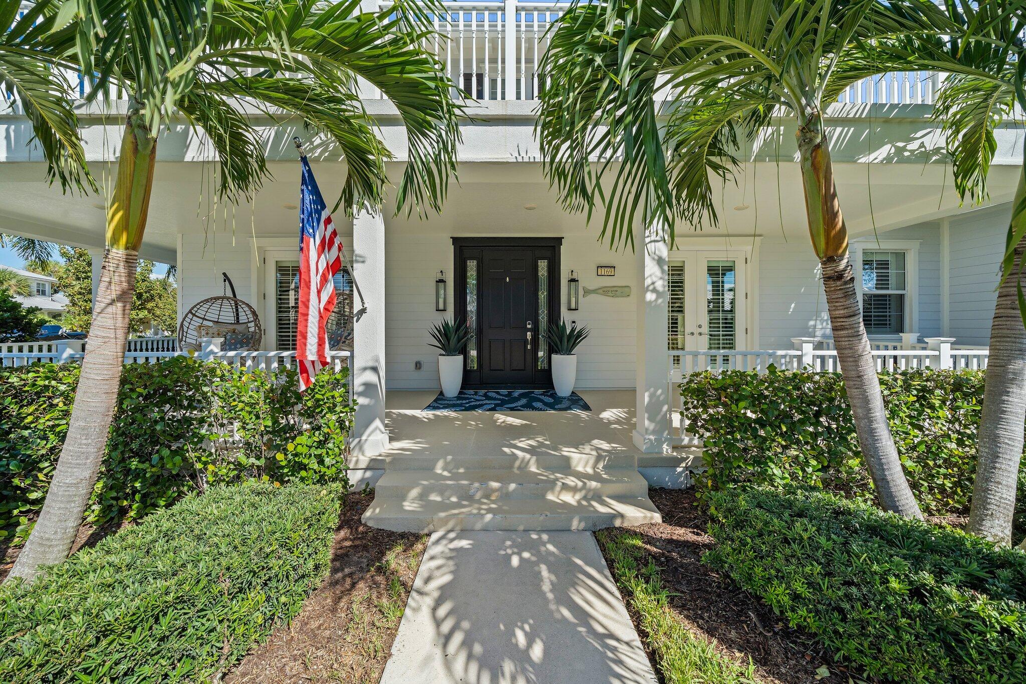 1169 Tropical Drive Jupiter, FL 33458 - Photo 5 of 113 Front Exterior