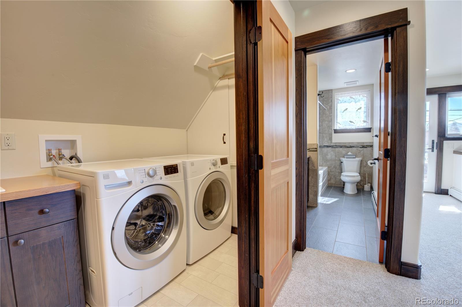 315 G Street Salida, CO 81201 - Photo 27 of 43 a view of a hallway with washer and dryer