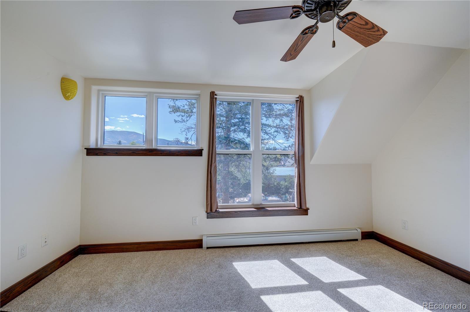 315 G Street Salida, CO 81201 - Photo 34 of 43 an empty room with windows and fan