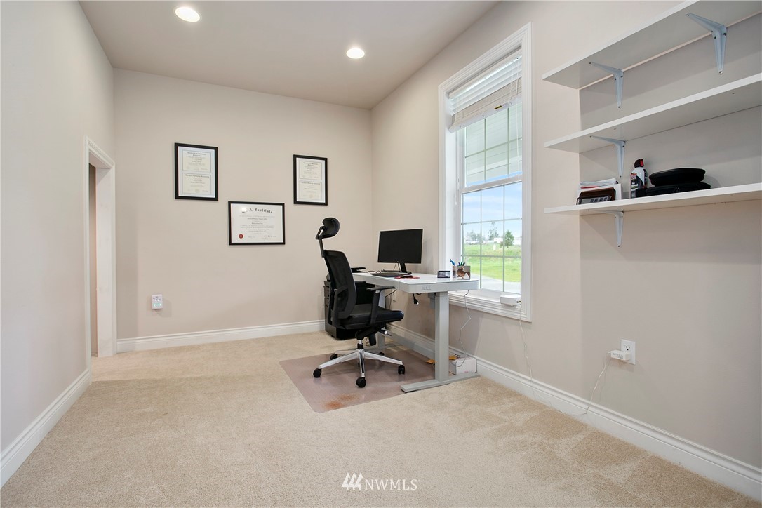6580 Olson Road Ferndale, WA 98248 - Photo 23 of 38 a view of a workspace with furniture and a window