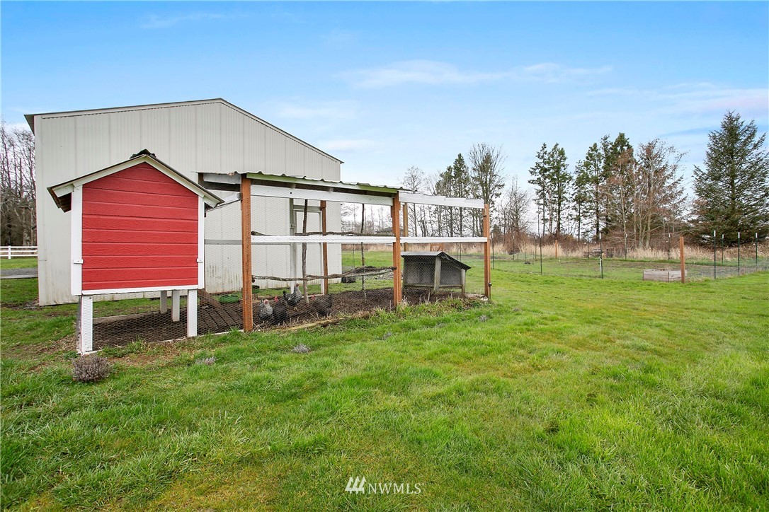 6580 Olson Road Ferndale, WA 98248 - Photo 5 of 38 a view of a house with a backyard