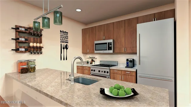 a kitchen with a sink and a stove top oven