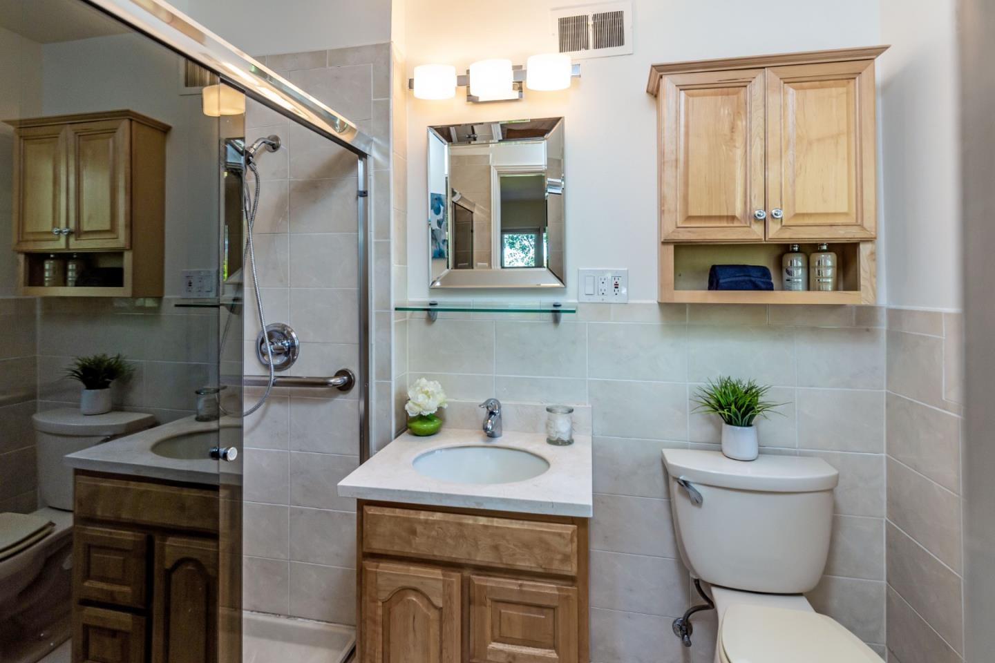 525 Outlook Drive Los Altos, CA 94024 - Photo 13 of 34 a bathroom with a sink a toilet and shower