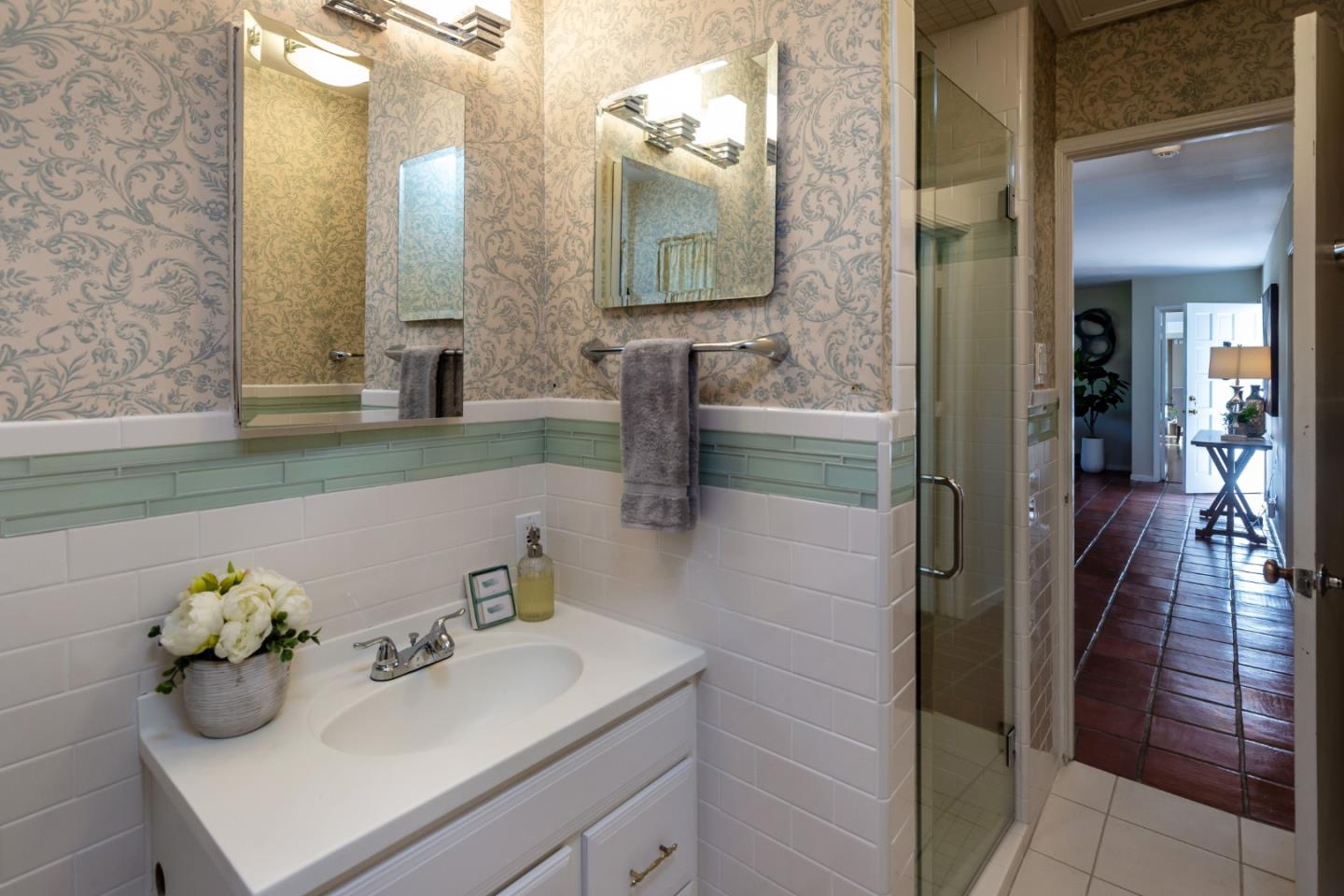 525 Outlook Drive Los Altos, CA 94024 - Photo 16 of 34 a bathroom with a sink mirror and vanity