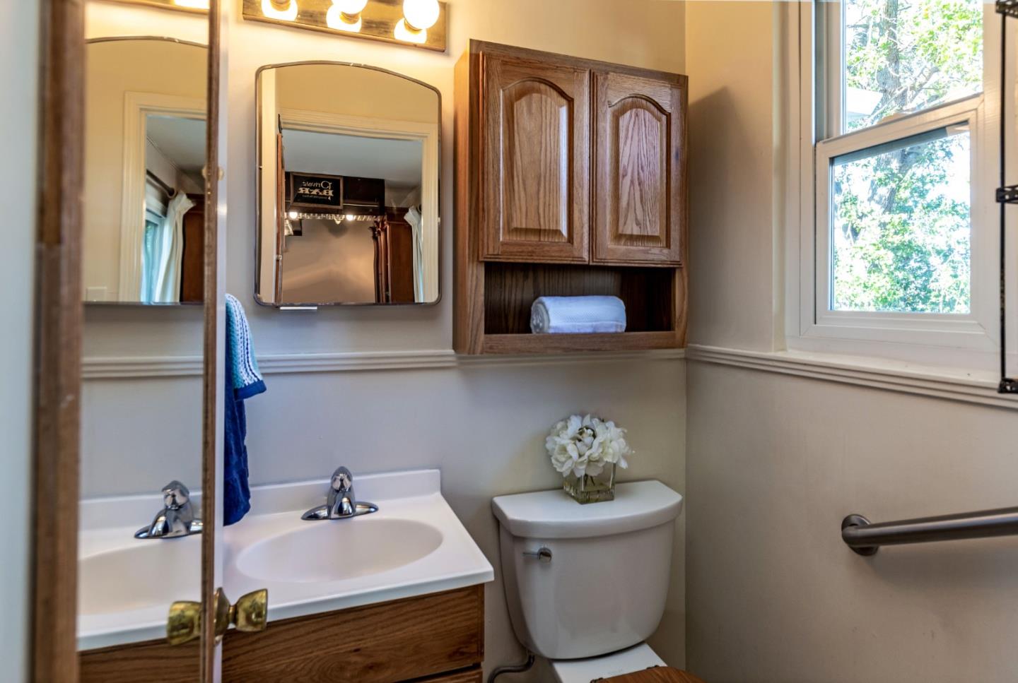 525 Outlook Drive Los Altos, CA 94024 - Photo 17 of 34 a bathroom with a toilet sink and mirror