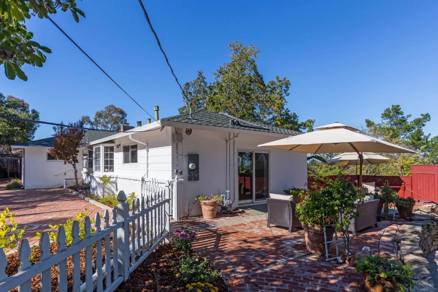 525 Outlook Drive Los Altos, CA 94024 - Photo 20 of 34 a front view of a house with garden