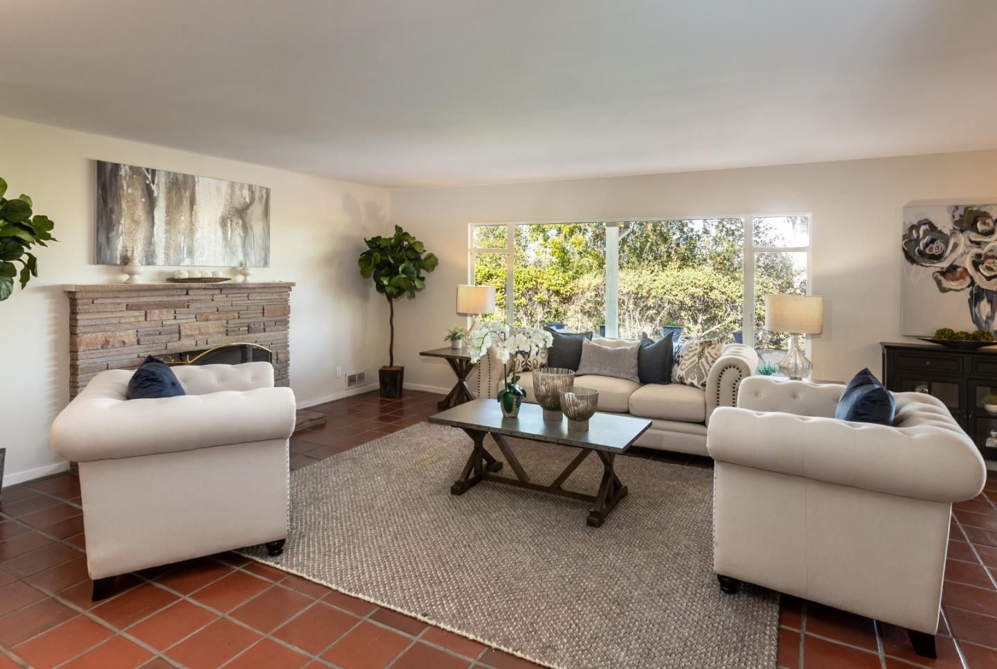 525 Outlook Drive Los Altos, CA 94024 - Photo 3 of 34 a living room with furniture and a fireplace