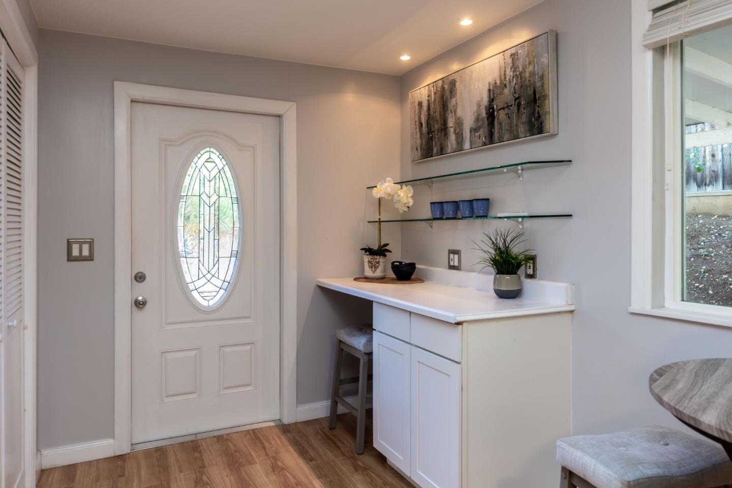 525 Outlook Drive Los Altos, CA 94024 - Photo 27 of 34 a hallway with sink washer and dryer