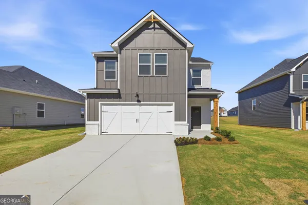 a front view of house with yard