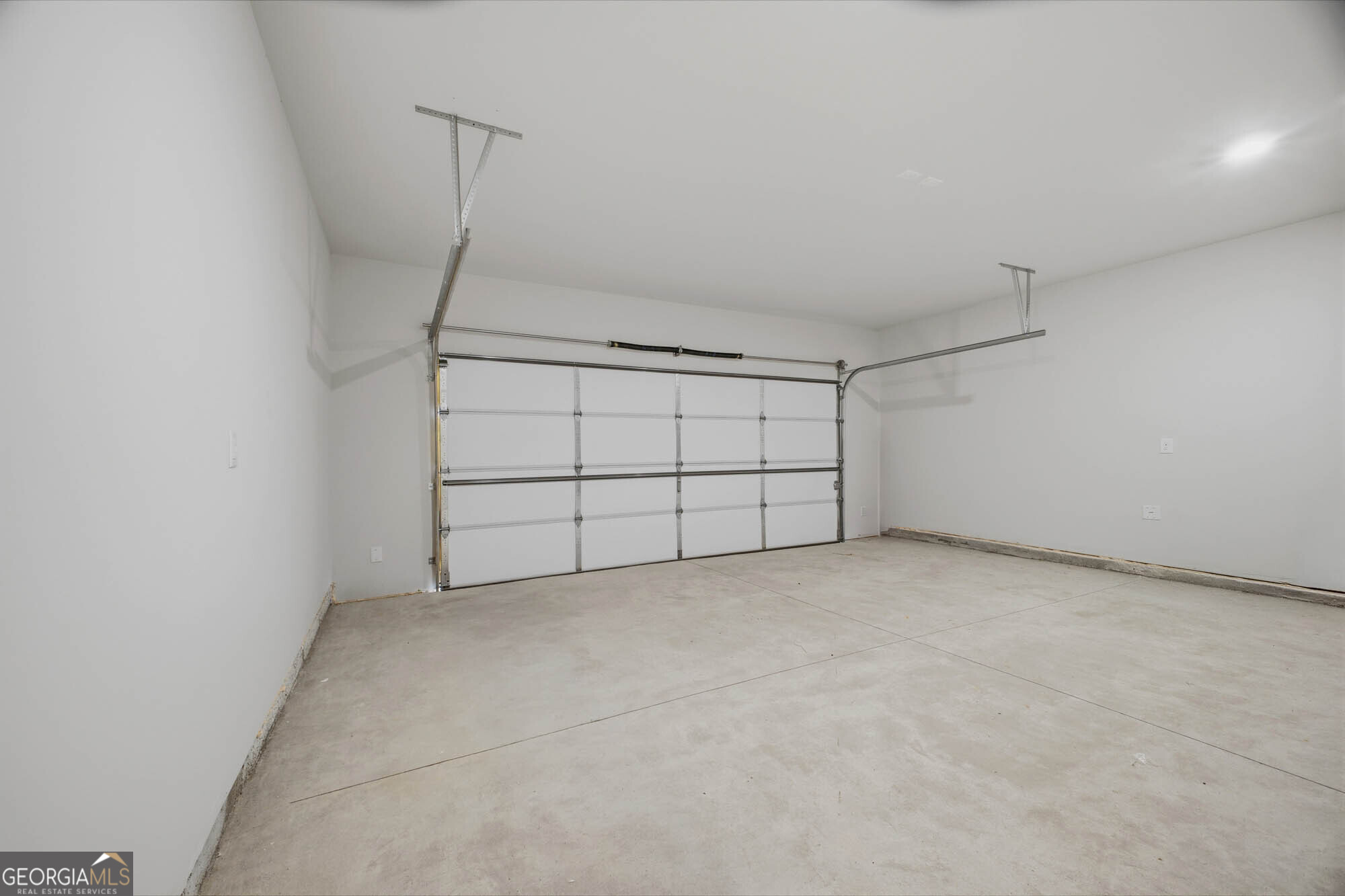 305 Rusty Plow Lane, Unit 13 Perry, GA 31069 - Photo 11 of 24 a view of a garage