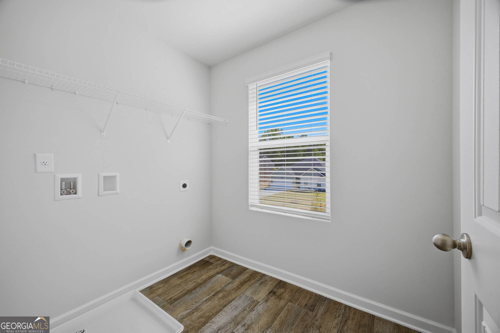 305 Rusty Plow Lane, Unit 13 Perry, GA 31069 - Photo 13 of 24 a view of a room with a window