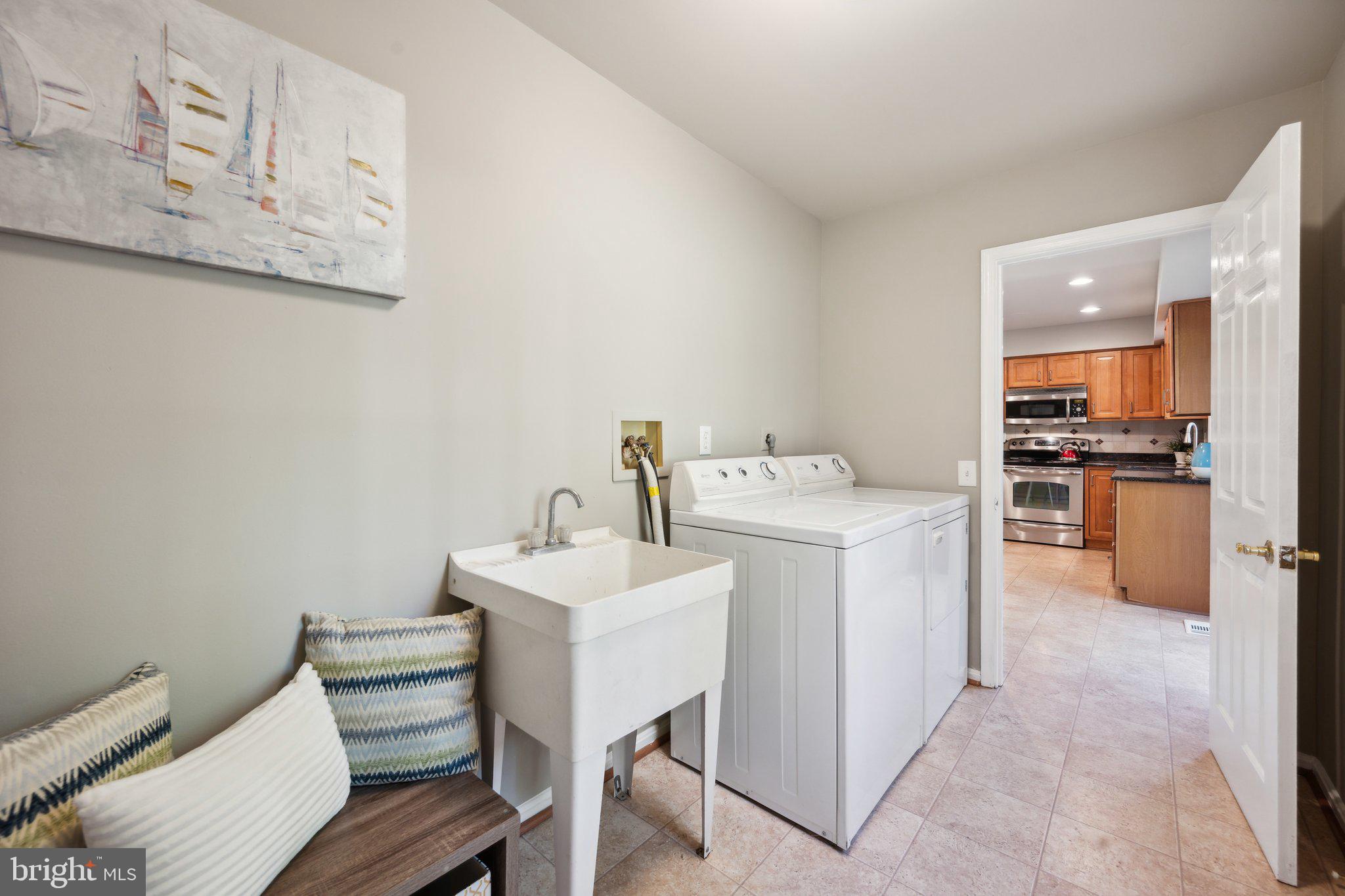 11421 Classical Lane Silver Spring, MD 20901 - Photo 14 of 35 Mud room/ laundry room off of the 2 car garage.