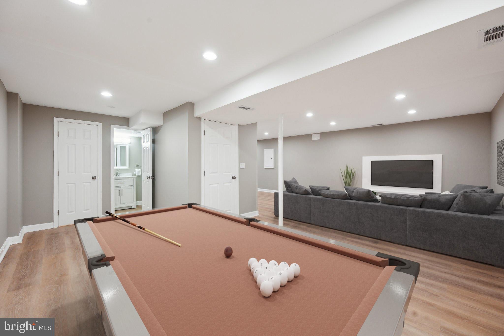 11421 Classical Lane Silver Spring, MD 20901 - Photo 28 of 35 Virtually Staged game room in basement