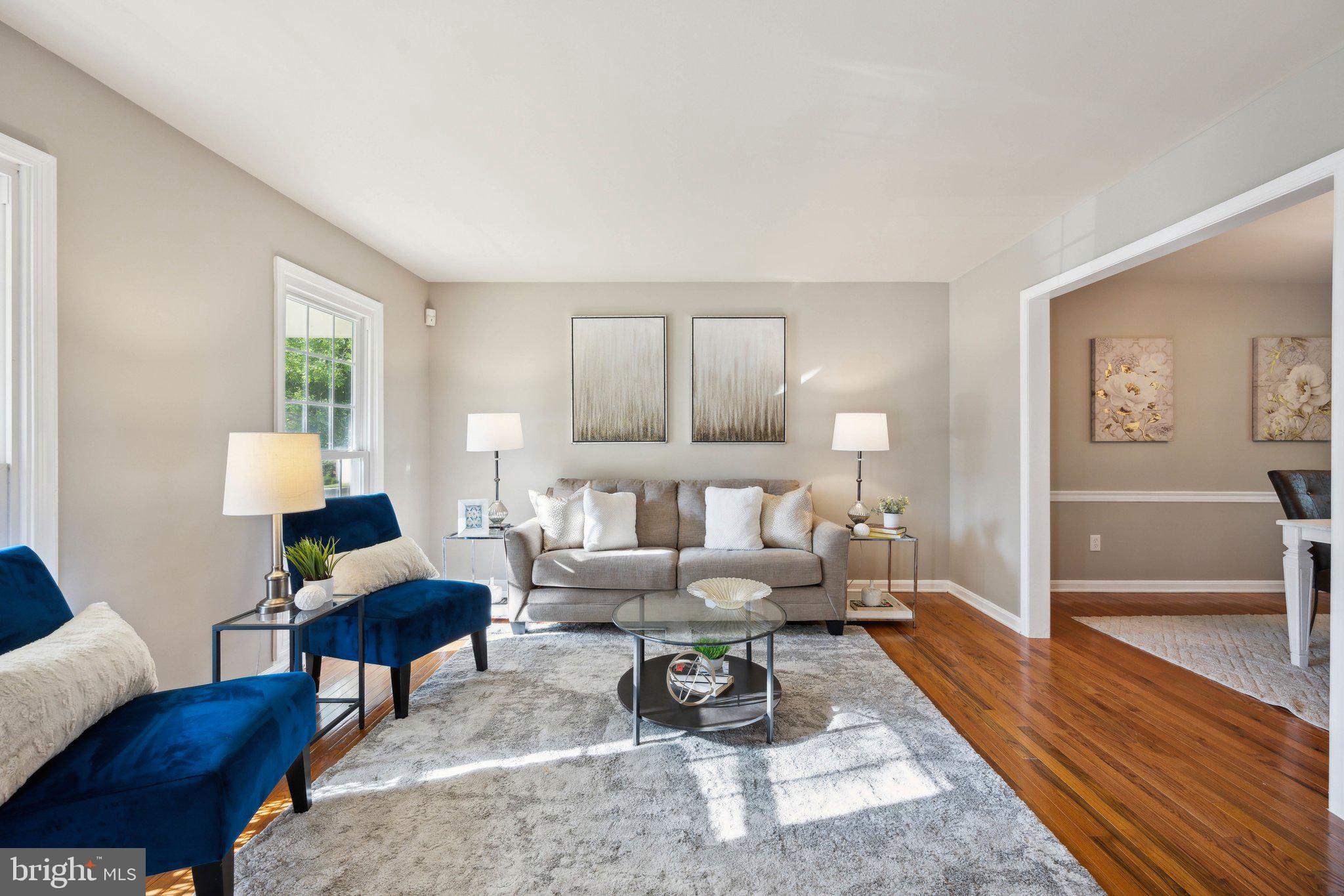 11421 Classical Lane Silver Spring, MD 20901 - Photo 4 of 35 Living room leading into the formal dining room