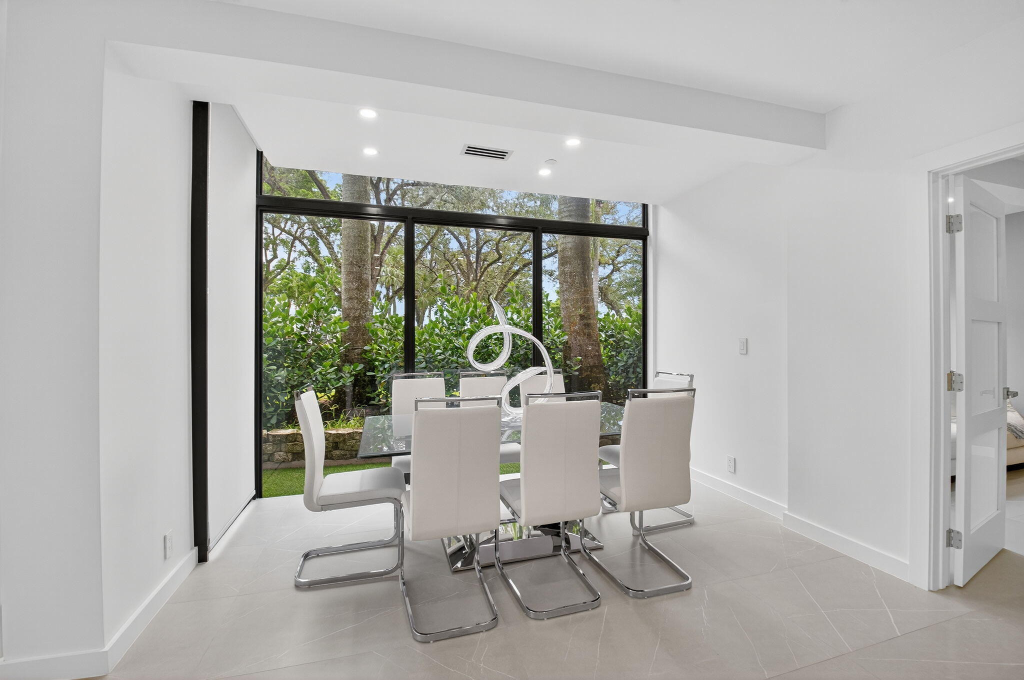 7847 Lakeside Boulevard, Unit 1014 Boca Raton, FL 33434 - Photo 14 of 53 a view of a dining room with furniture window and outside view