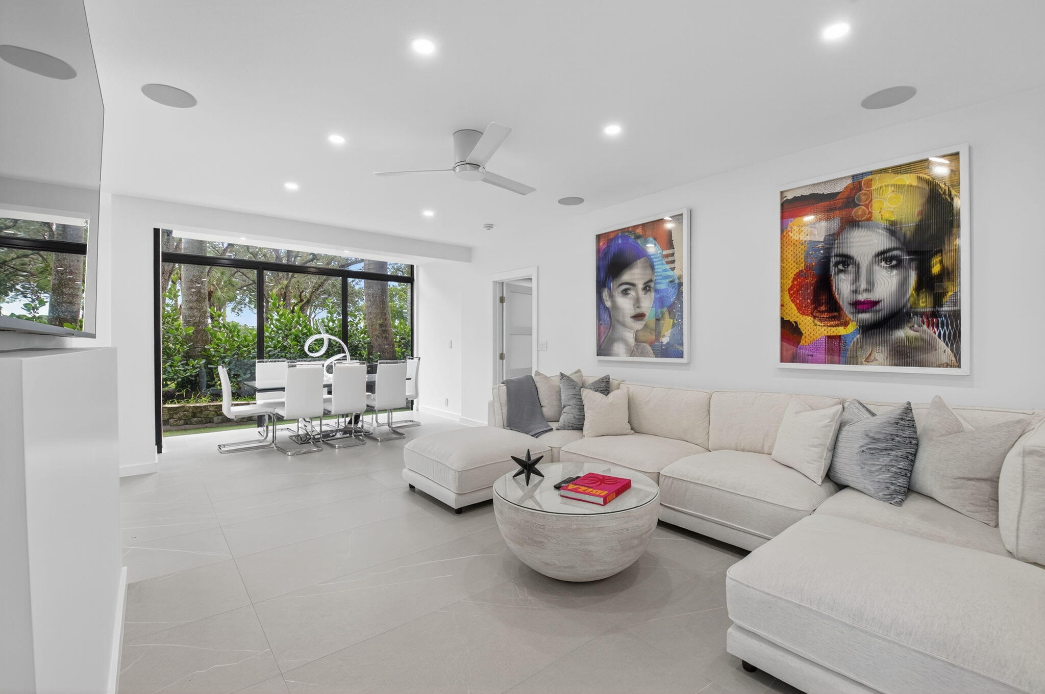 7847 Lakeside Boulevard, Unit 1014 Boca Raton, FL 33434 - Photo 18 of 53 a living room with furniture and a large window