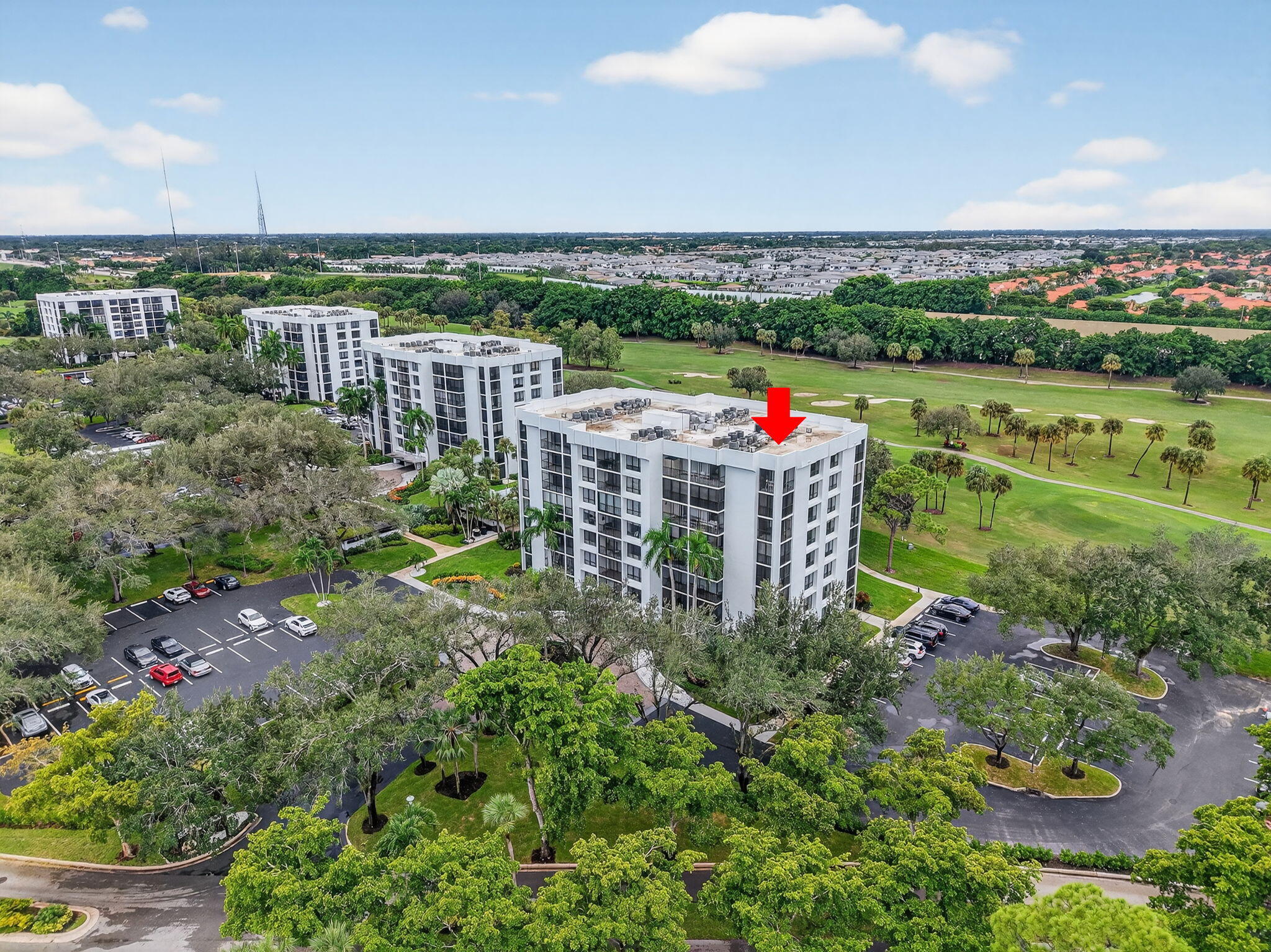 7847 Lakeside Boulevard, Unit 1014 Boca Raton, FL 33434 - Photo 34 of 53 a view of a garden with a lake