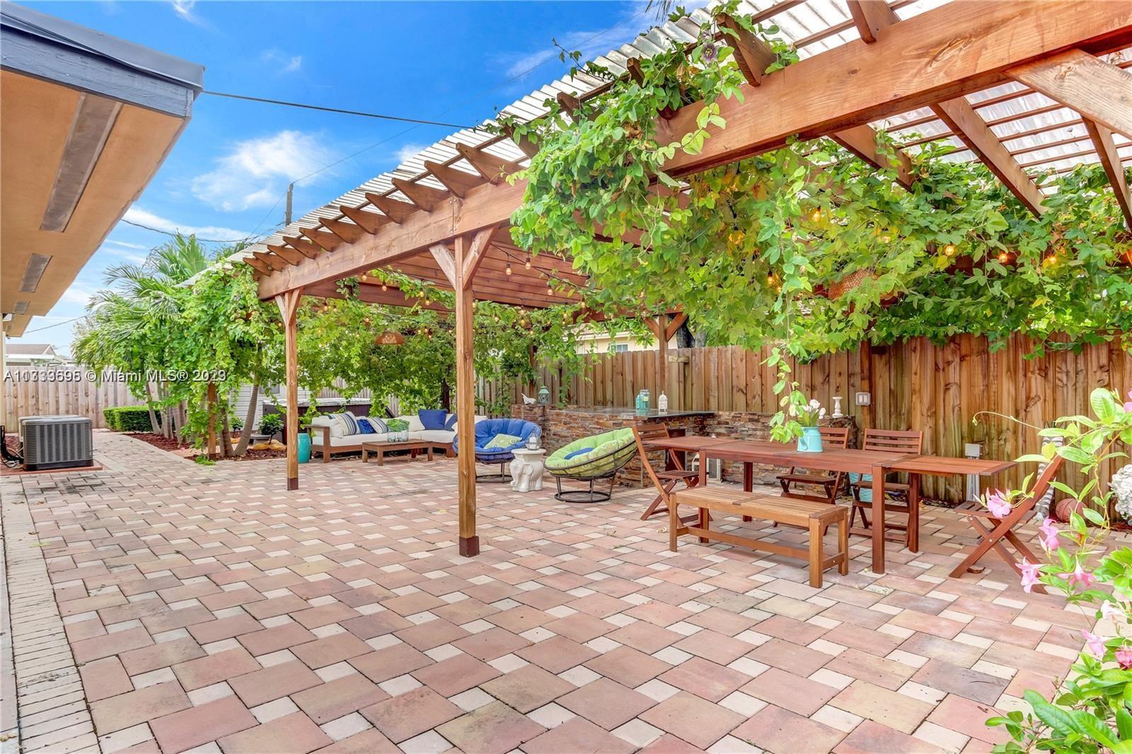 12015 Bird Road Miami, FL 33175 - Photo 12 of 16 a view of outdoor space yard and patio