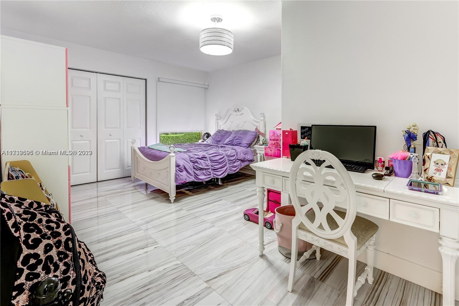 12015 Bird Road Miami, FL 33175 - Photo 8 of 16 a living room with furniture and wooden floor