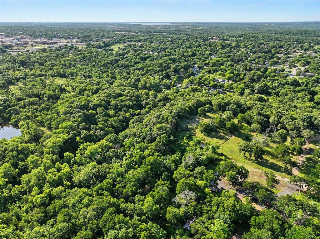 830 East Morgan Street Denison, TX 75021 - Photo 4 of 8 a view of a green field