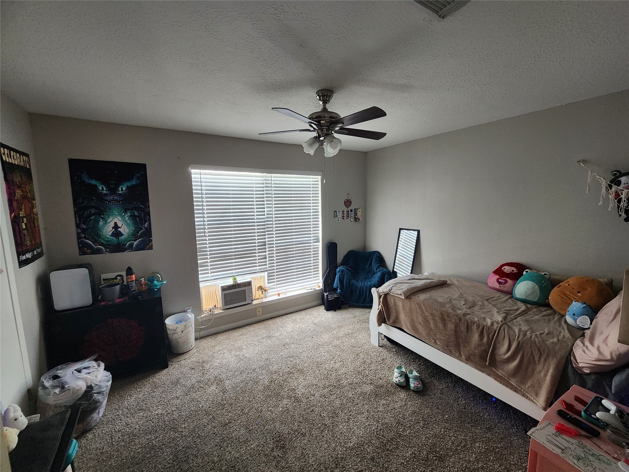 517 5th Street, Unit 4 Humble, TX 77338 - Photo 20 of 36 a bedroom with furniture and a window