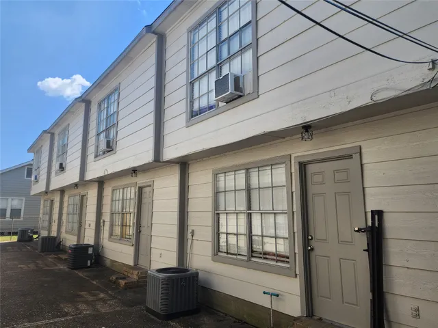 a front view of a building with glass windows