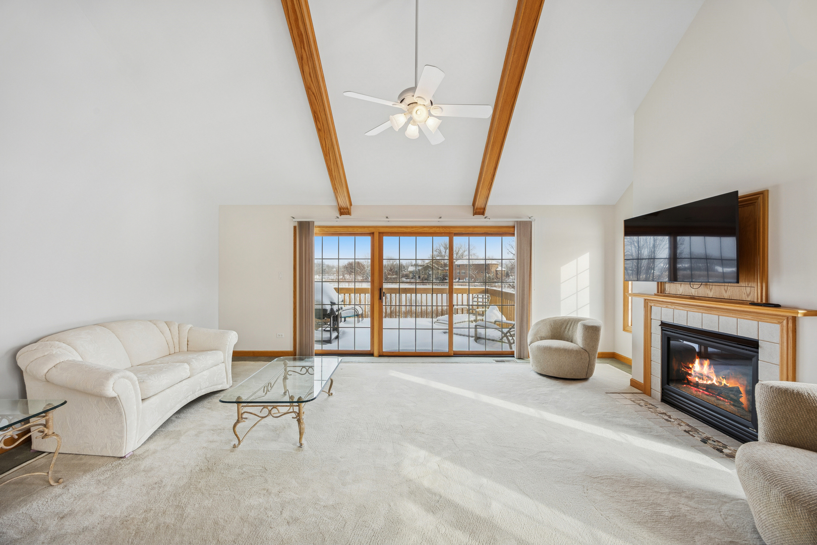 13773 Steeples Road Lemont, IL 60439 - Photo 13 of 30 a living room with furniture and a fireplace