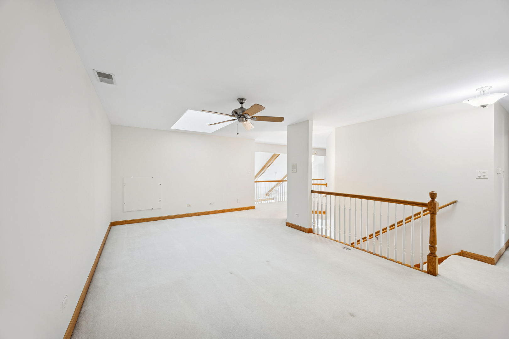 13773 Steeples Road Lemont, IL 60439 - Photo 21 of 30 a view of a hallway with staircase