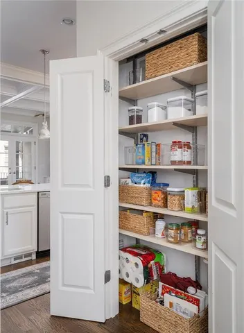 a room with storage and utility