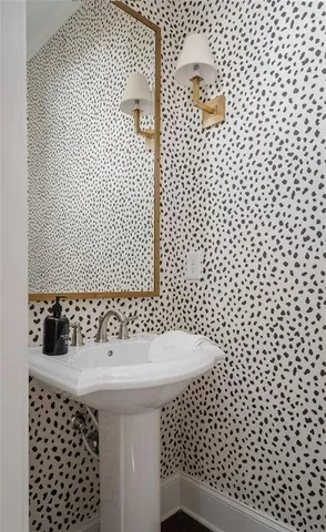 a bathroom with a sink and a shower