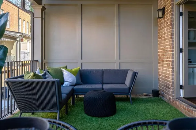 a living room with furniture and a yard