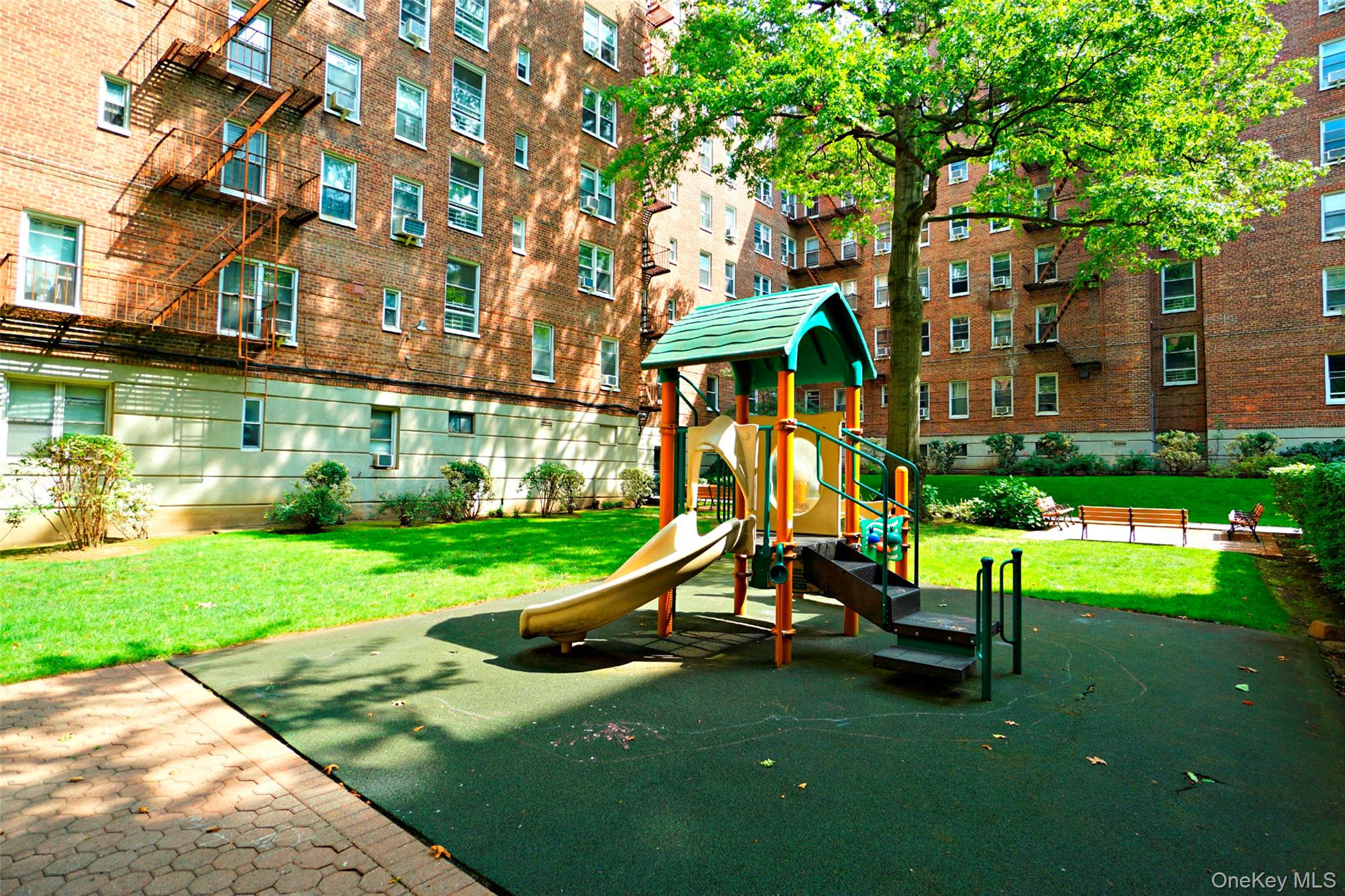 7281 113th Street, Unit 5F Queens, NY 11375 - Photo 19 of 22 a view of a park with large trees