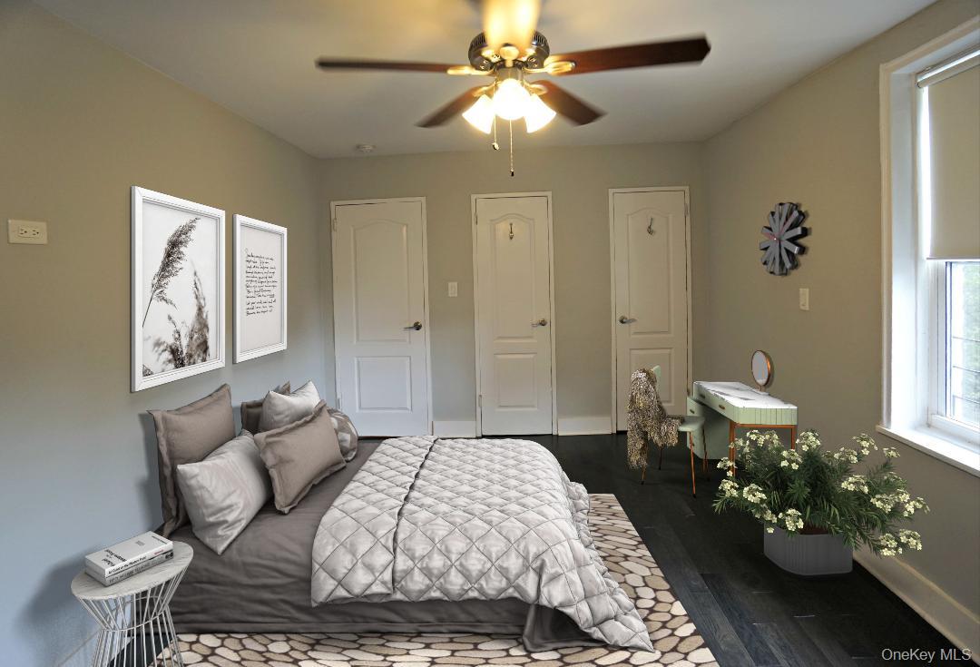 7281 113th Street, Unit 5F Queens, NY 11375 - Photo 9 of 22 a bedroom with a bed and ceiling fan