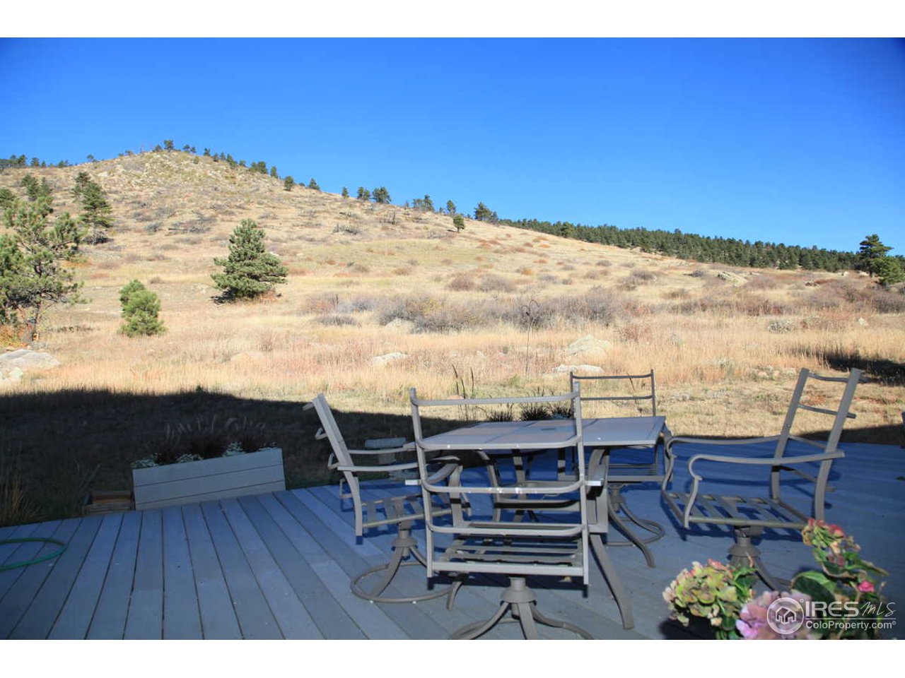 3061 Foothills Ranch Drive Boulder, CO 80302 - Photo 16 of 19 a view of a terrace with seating area
